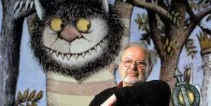Photograph from PBS.org of Maurice Sendak with a picture of one of the creatures from Where the Wild Things Are behind him