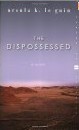 Book cover of The Dispossessed shows a landscape of mostly plains and hills to the left. The sky is purple with rose tones towards the horizon.