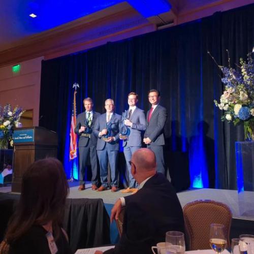 From left, Durham Tech President J.B. Buxton, Wake Tech President Scott Ralls, Senior Director of Human Resources at Lilly RTP Joe Owen and Economic Development Partnership Chief Executive Officer Chris Chung at the Pinnacle Awards ceremony.