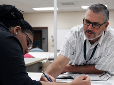 instructor tutoring a student