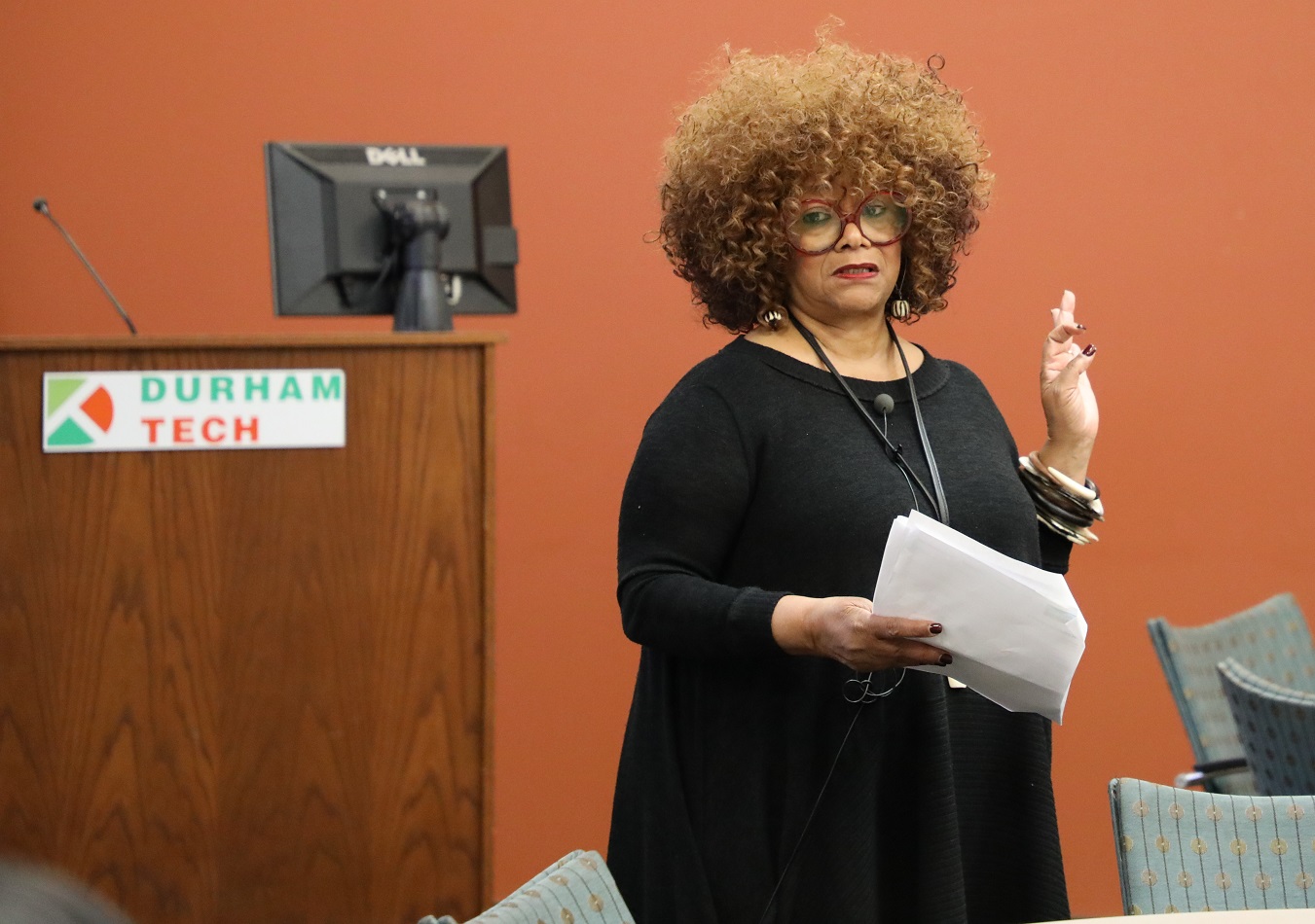 jaki shelton green standing in front of durham tech podium speaking