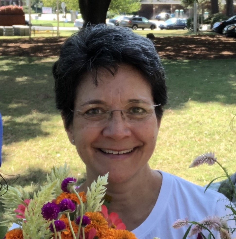 headshot of sue cheng