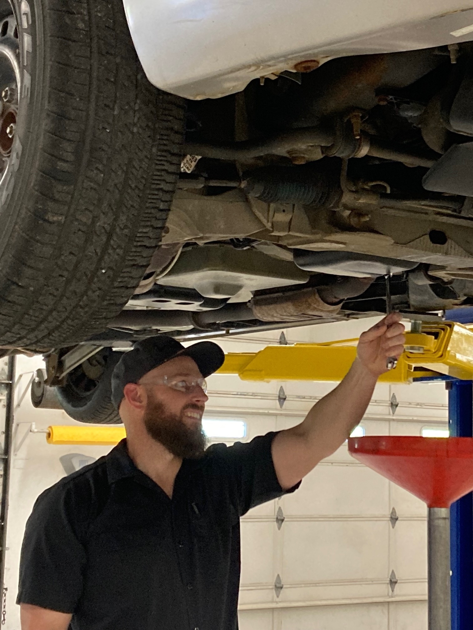 Tim Platz at work in Durham Tech's automotive bay.