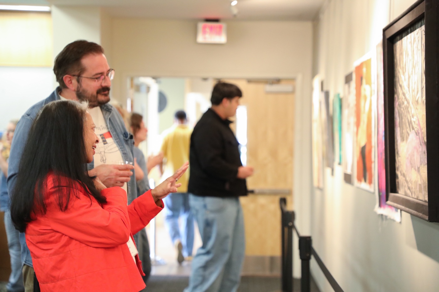 Attendees enjoy the art during the celebration
