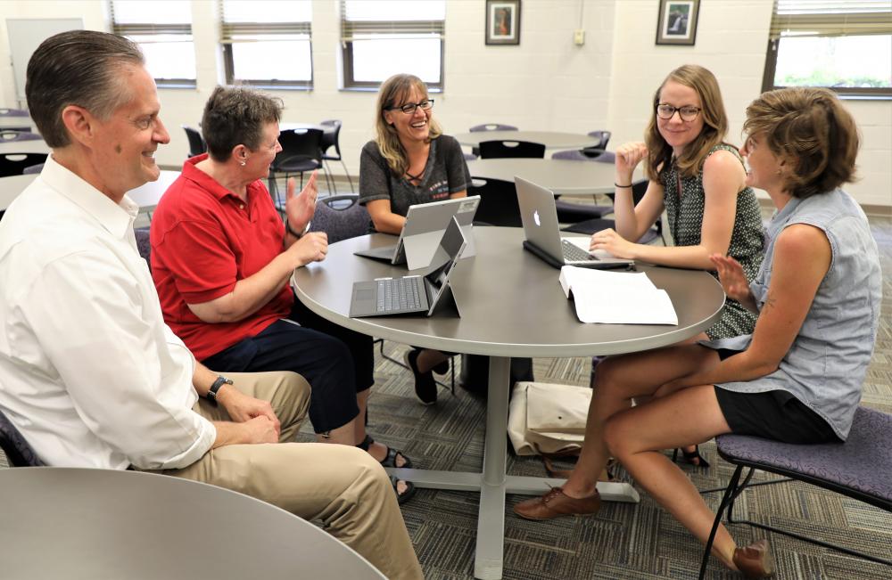 durham tech faculty duke students work together in project