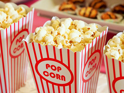 Popcorn in a red striped box