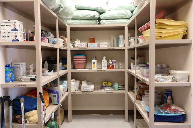storage shelves with nursing supplies