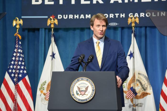 person speaking at podium