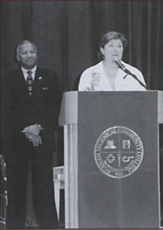 person speaking at podium