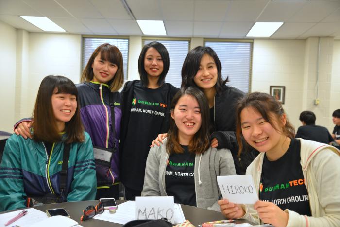 group of people smiling at camera