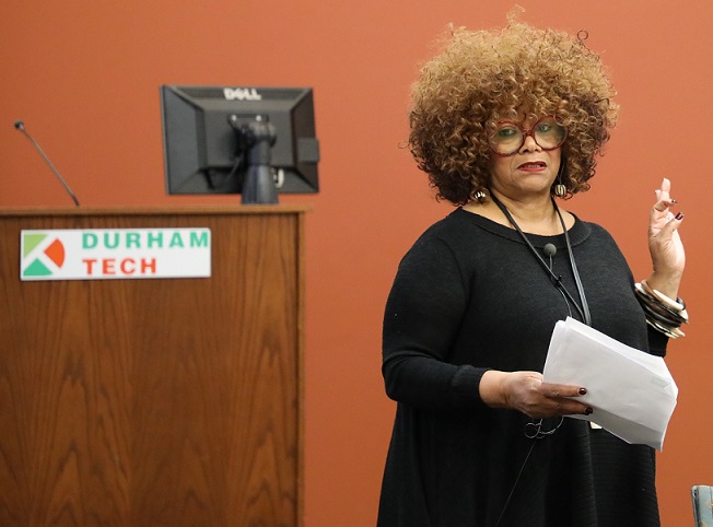 jaki shelton green standing in front of durham tech podium speaking