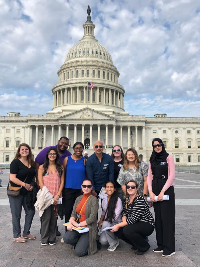 group of people in front of U.S. Capitol