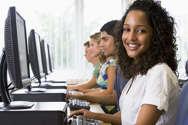 Photo of students using computers in the library