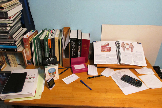anatomy and science textbooks on a desk