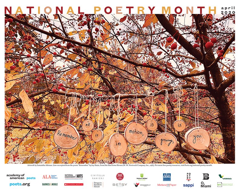 Image of tree with pieces of wood hanging that features the following line from the poem "Remember" by current U.S. Poet Laureate, Joy Harjo: “Remember all is in motion, is growing, is you.”