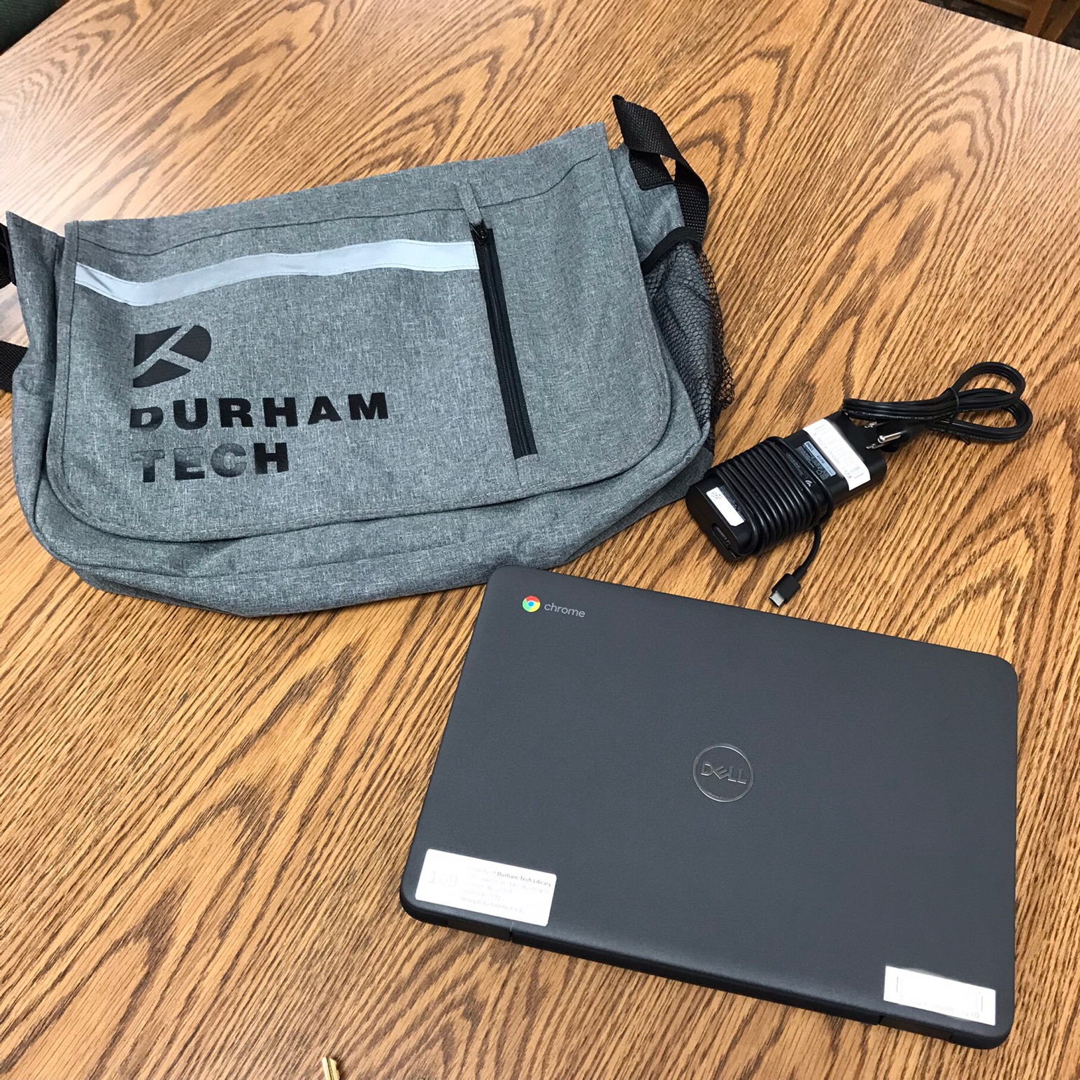 Dell Chromebook, Durham Tech bag, and charger