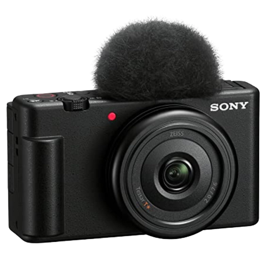 A small black Sony vlogging camera with a flip-out screen.