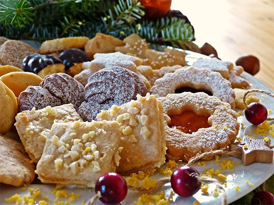 a diverse selection of Christmas cookies on a plate