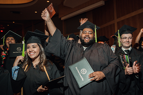 cheering graduates