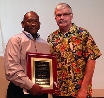 Greg poses with President Ingram