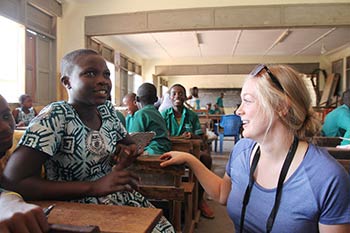 Durham Tech student talks with schoolgirl