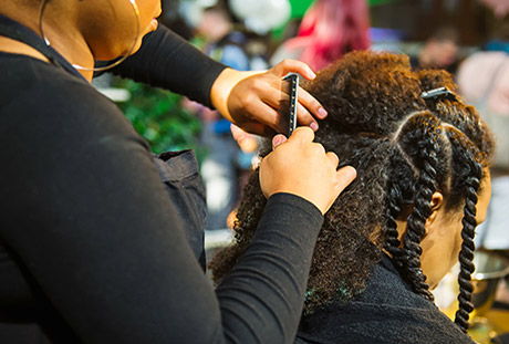 braiding large cornrows into natural hair