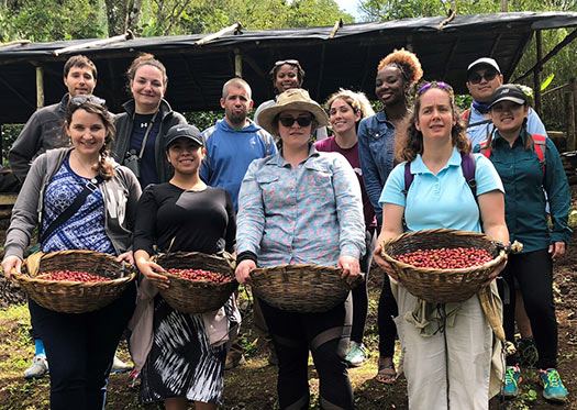 travel group hold baskets of coffee beans