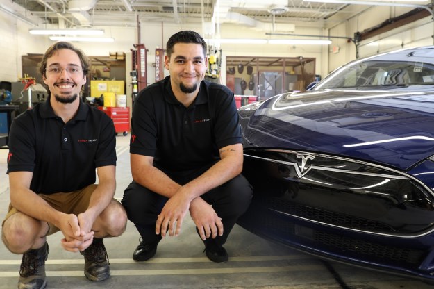 automotive students with tesla