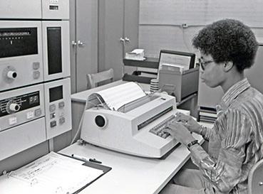 1971 student uses electric typewriter to create computer forms