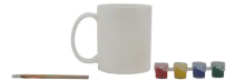 white mug with paintbrush and four colors of paint: red, yellow, blue, and green (the components of the mug painting kit)
