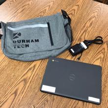 Dell Chromebook, Durham Tech bag, and charger