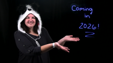 Image of a woman wearing a panda hat pointing to the words coming in 2026
